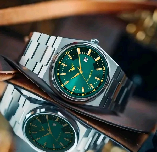 Ecuador HMTS Quartz Analog Wrist Watch for Men – Stylish Green Dial, Silver Chain Strap
- Free