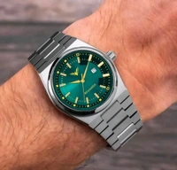 Ecuador HMTS Quartz Analog Wrist Watch for Men – Stylish Green Dial, Silver Chain Strap
- Free