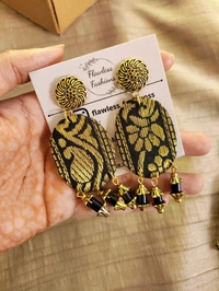 Black oval drops
