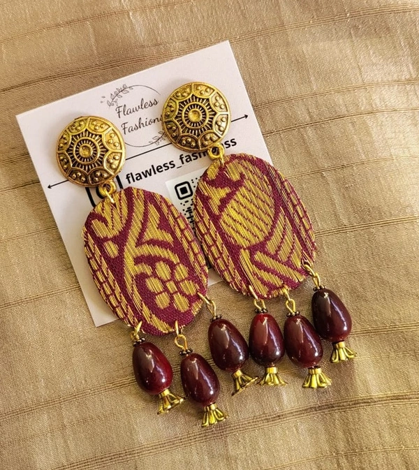 Maroon oval drops