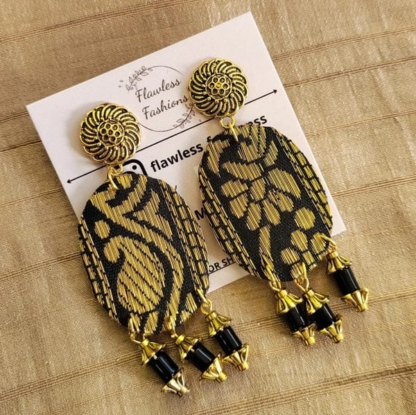 Black oval drops