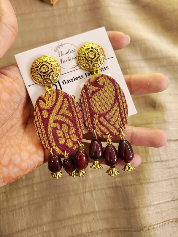 Maroon oval drops