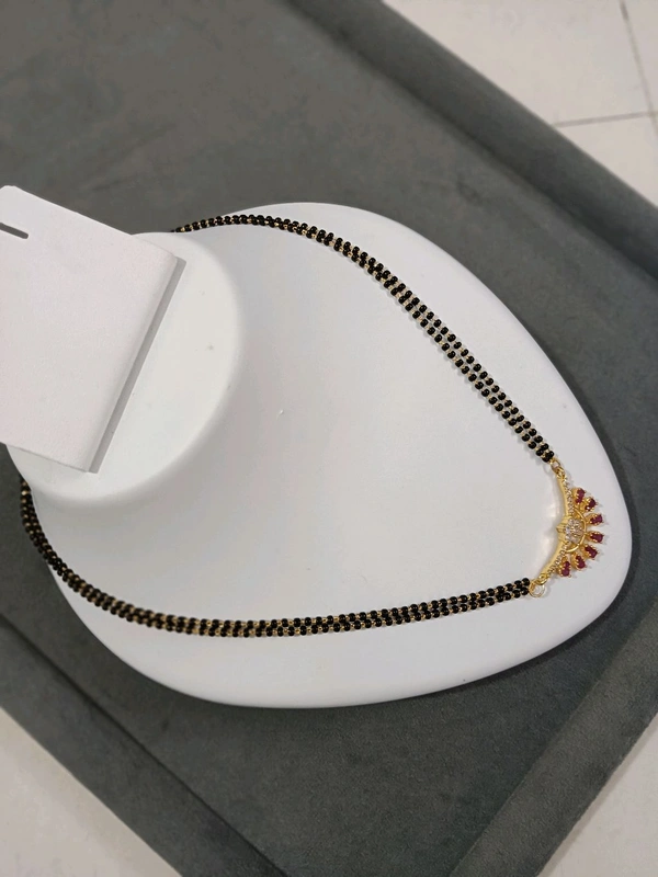 Black Beads With Gold Copy Pendant 