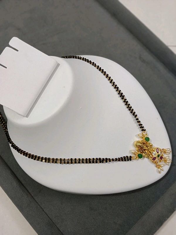 2 Lines Black Beads With Gold Copy Pendant 