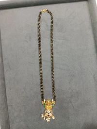 2 Lines Black Beads With Gold Copy Pendant 