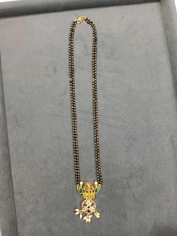 2 Lines Black Beads With Gold Copy Pendant 