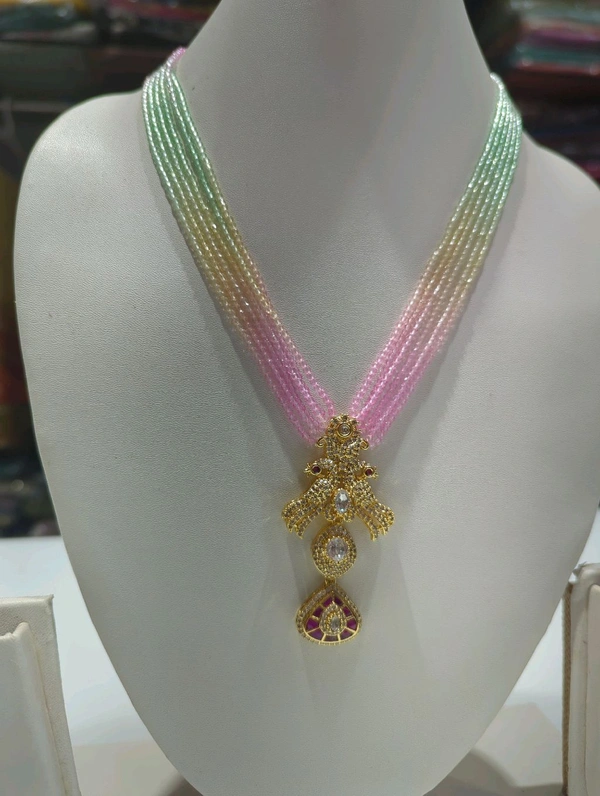 Australian Spinnals With Jadua Pendent
