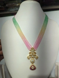 Australian Spinnals With Jadua Pendent