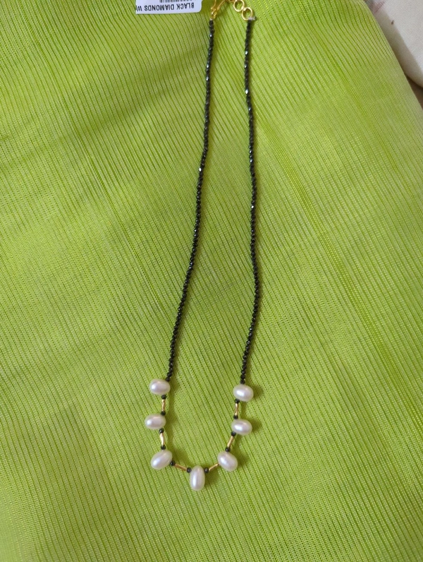 BLACK DIAMONDS WITH REAL PEARLS
