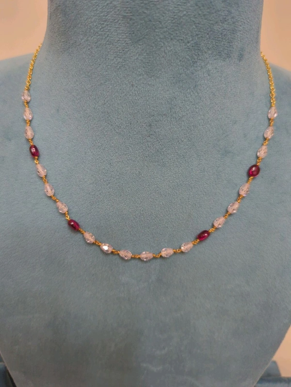 WHITE CZS WITH REAL RUBY