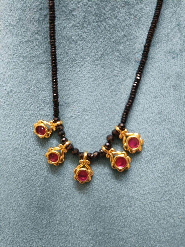 BLACK DIAMONDS WITH SMALL LOCKET