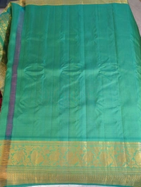 Pure Handloom Gadwal Pattu With Kuttu Boarders  - Green