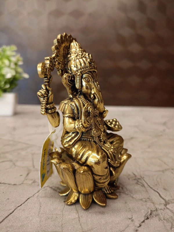 Brass Fine Art Ganesha Sitting On Lotus Base idol 