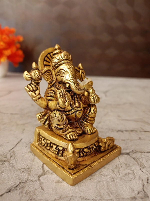 Brass Ganesha statue Sitting On Square base With Kalasam / Anchor Your Home in Divine Tranquility with Our Seated Brass Ganesha Idol