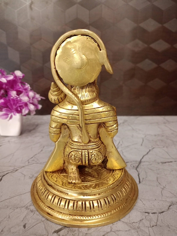 Brass Hanuman Statue Sitting On Round Base
