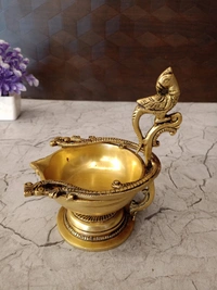 DecorsOne Brass Designer Peacock handle Diya 6″