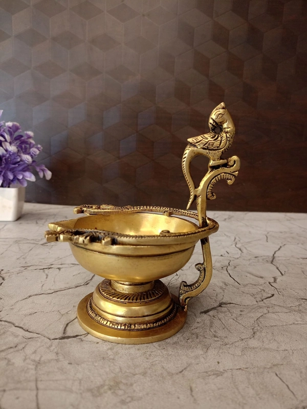 DecorsOne Brass Designer Peacock handle Diya 6″