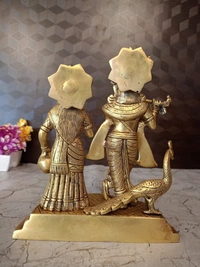 Brass Radha Krishna With Peacock Idol 