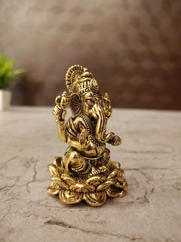 Brass Fine art Ganesha on Lotus Idol
