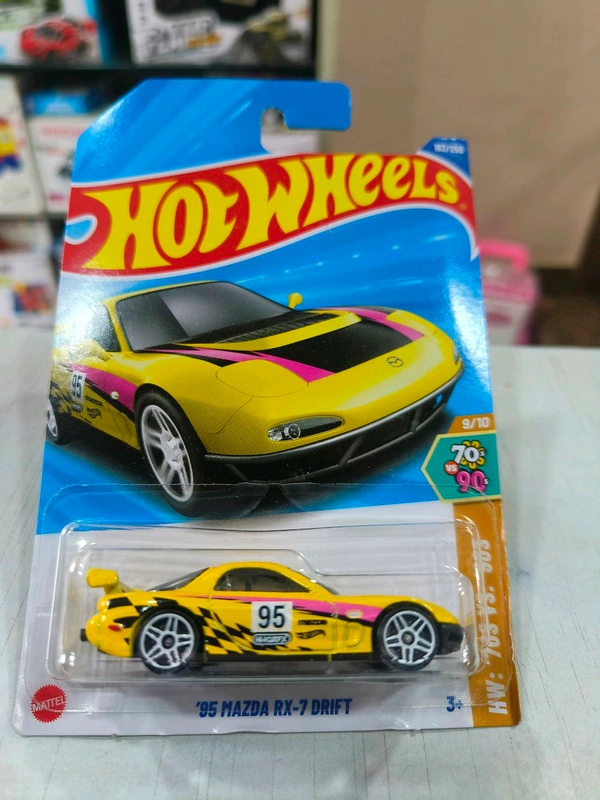 HOT WHEELS Hotwheels | ‘95 MAZDA RX-7 DRIFT | HW ‘70s Vs. ‘90s | YELLOW | IMPORTED | H CASE | 163/250