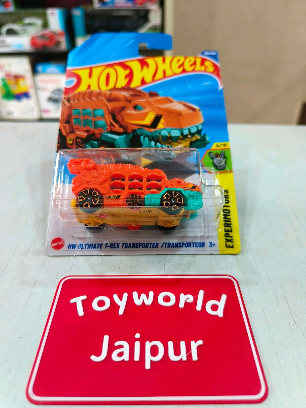 Hot Wheels HW Race 156/250 Circle Trucker on Short Card HW Ultimate T-rex Transporter | Experimotors | Orange | 156⁄250