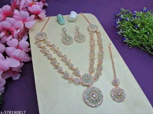 Two Layer Classic Rose Gold FinishPartywear Jewellery SetName: Two Layer Classic Rose Gold FinishPartywear Jewellery SetBase Metal: AlloyPlating: Rose Gold PlatedStone Type: Cubic Zirconia/American DiamondSizing: AdjustableType: Necklace Earrings MaangtikaNet Quantity (N): 1Two Layer Classic Rose Gold FinishPartywear Jewellery SetCountry of Origin: India