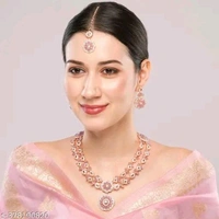 Two Layer Classic Rose Gold FinishPartywear Jewellery SetName: Two Layer Classic Rose Gold FinishPartywear Jewellery SetBase Metal: AlloyPlating: Rose Gold PlatedStone Type: Cubic Zirconia/American DiamondSizing: AdjustableType: Necklace Earrings MaangtikaNet Quantity (N): 1Two Layer Classic Rose Gold FinishPartywear Jewellery SetCountry of Origin: India
