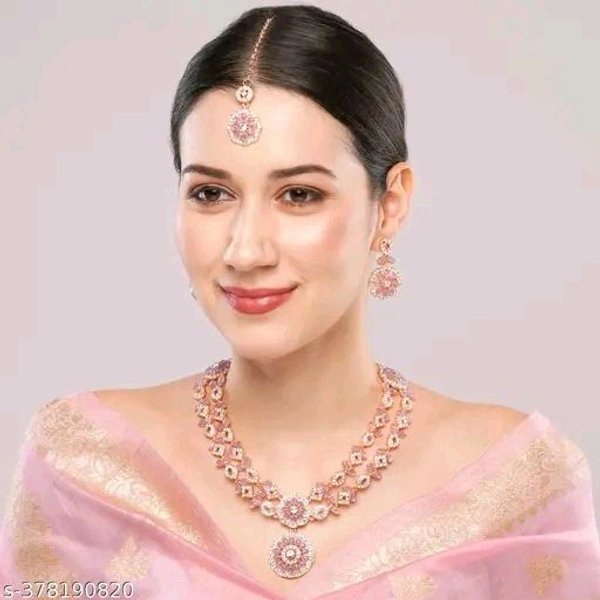 Two Layer Classic Rose Gold FinishPartywear Jewellery SetName: Two Layer Classic Rose Gold FinishPartywear Jewellery SetBase Metal: AlloyPlating: Rose Gold PlatedStone Type: Cubic Zirconia/American DiamondSizing: AdjustableType: Necklace Earrings MaangtikaNet Quantity (N): 1Two Layer Classic Rose Gold FinishPartywear Jewellery SetCountry of Origin: India