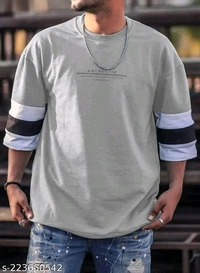 Catalog Name:*Comfy Glamorous Men Tshirts*Fabric: Cotton BlendSleeve Length: Three-Quarter SleevesPattern: PrintedNet Quantity (N): 1Sizes:S (Chest Size: 39 in, Length Size: 27 in) M (Chest Size: 41 in, Length Size: 27.5 in) L (Chest Size: 43 in, Length Size: 28 in) XL (Chest Size: 45 in, Length Size: 28.5 in) XXL (Chest Size: 47 in, Length Size: 29 in) Dispatch: 1 Day*Proof of Saf
