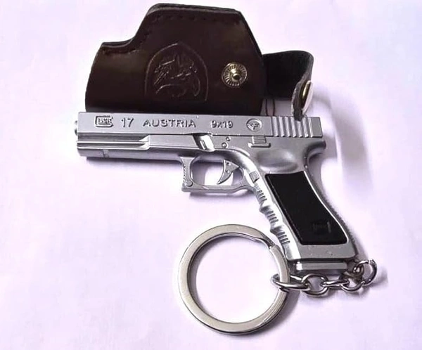  Silver Tactical Defender Metal Gun Keychain with Holster New 5.0 5.0 out of 5 stars    1 rating