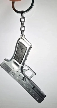  Silver Tactical Defender Metal Gun Keychain with Holster New 5.0 5.0 out of 5 stars    1 rating