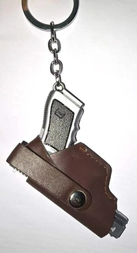  Silver Tactical Defender Metal Gun Keychain with Holster New 5.0 5.0 out of 5 stars    1 rating