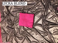 A lycra blend saree With blouse combines the elegance of traditional sarees with the comfort and stretch of lycra fabric. Pair it with a chic blouse and statement accessories to create a glamorous ensemble that exudes confidence and charm. - Free Size