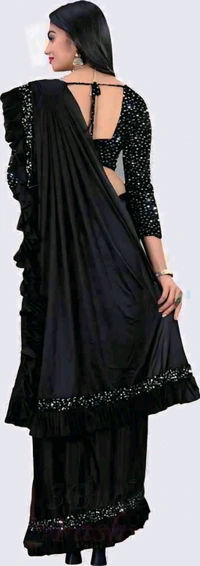 FANCY Black Ruffle Wadding SareeWith Blouse. Perfect for parties, receptions, or evening events, this saree pairs beautifully with statement jewelry and high heels, creating a stunning contemporary look. - Free Size