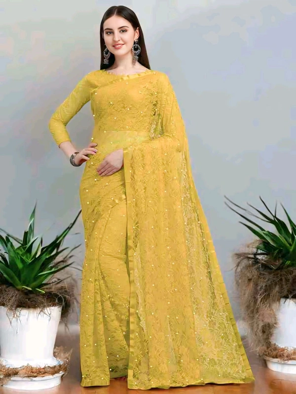Brasso Net Yellow Beads & StonesSaree With Blouse. Brasso net saree is a stunning blend of traditional charm and contemporary elegance.  - Free Size