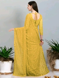 Brasso Net Yellow Beads & StonesSaree With Blouse. Brasso net saree is a stunning blend of traditional charm and contemporary elegance.  - Free Size