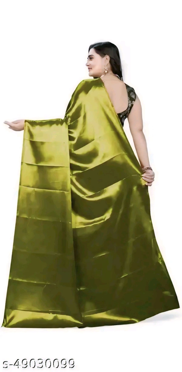 sana silk satin silk Green saree with Blouse. Elevate your elegance with this luxurious Sana Silk Satin Saree. Crafted from premium quality satin silk.  - Free Size