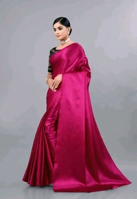 sana silk satin silk Purple saree with Blouse. Elevate your elegance with this luxurious Sana Silk Satin Saree. Crafted from premium quality satin silk.  - Free Size