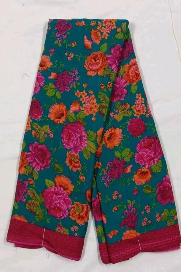 Georgette  Saree With Blouse. A georgette saree is a lightweight, sheer, and flowy drape made from georgette fabric, known for its soft texture and graceful fall. - Free Size