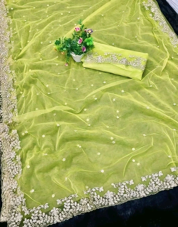 Assam Silk Net Yellow Beads & Stones Saree With Blouse. An Assam Silk Net Saree is a perfect blend of tradition and modernity. It combines the elegance of Assam silk with the lightweight, breathable texture of net fabric. - Free Size