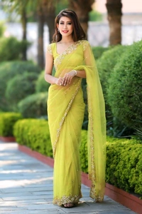 Assam Silk Net Yellow Beads & Stones Saree With Blouse. An Assam Silk Net Saree is a perfect blend of tradition and modernity. It combines the elegance of Assam silk with the lightweight, breathable texture of net fabric. - Free Size