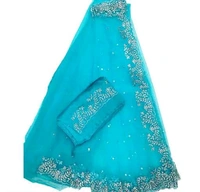 hazaar butti Net Aqua Blue Embroidered Saree. Paired with a matching blouse, the saree offers a contemporary yet traditional look. Its lightweight nature ensures comfort while draping beautifully, allowing you to make a graceful statement wherever you go. - Free Size