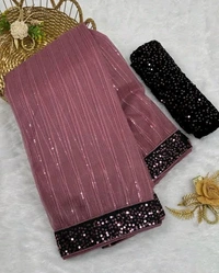 UNIQUE DESIGN SEQUINS WORK SAREE WITH BLOUSE PIECE. This masterpiece features intricate sequin work crafted in a rhythmic pattern that reflects timeless sophistication. Designed to make every occasion extraordinary, this saree combines luxury with comfort, perfect for weddings, parties, or festive gatherings.  - Free Size