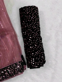 UNIQUE DESIGN SEQUINS WORK SAREE WITH BLOUSE PIECE. This masterpiece features intricate sequin work crafted in a rhythmic pattern that reflects timeless sophistication. Designed to make every occasion extraordinary, this saree combines luxury with comfort, perfect for weddings, parties, or festive gatherings.  - Free Size