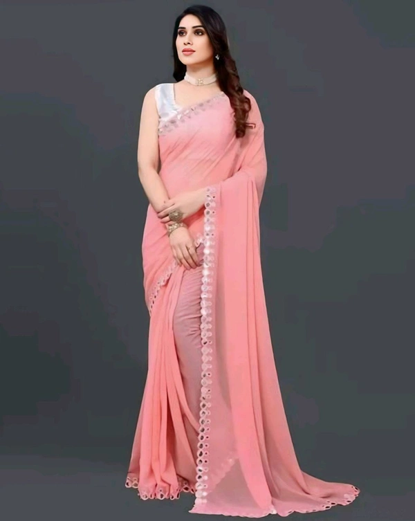 MANAN CREATION NEW FENCYGEORGETTE CUT WORK SAREE With Blouse . Elevate your ethnic wardrobe with the Manan Creation Fancy Georgette Saree. This elegant saree is crafted from premium georgette fabric, known for its lightweight feel and graceful drape. - Free Size