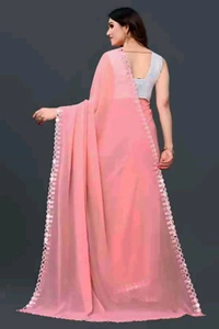 MANAN CREATION NEW FENCYGEORGETTE CUT WORK SAREE With Blouse . Elevate your ethnic wardrobe with the Manan Creation Fancy Georgette Saree. This elegant saree is crafted from premium georgette fabric, known for its lightweight feel and graceful drape. - Free Size