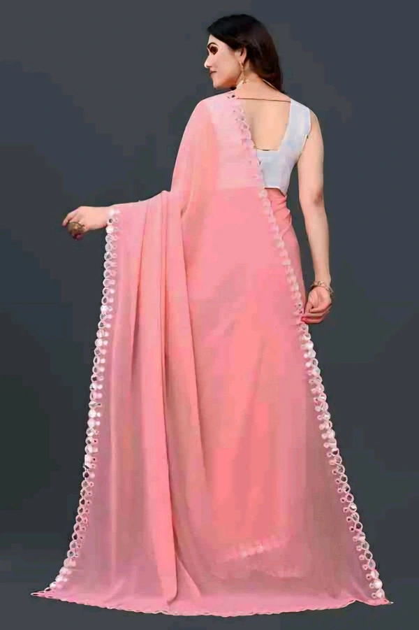 MANAN CREATION NEW FENCYGEORGETTE CUT WORK SAREE With Blouse . Elevate your ethnic wardrobe with the Manan Creation Fancy Georgette Saree. This elegant saree is crafted from premium georgette fabric, known for its lightweight feel and graceful drape. - Free Size