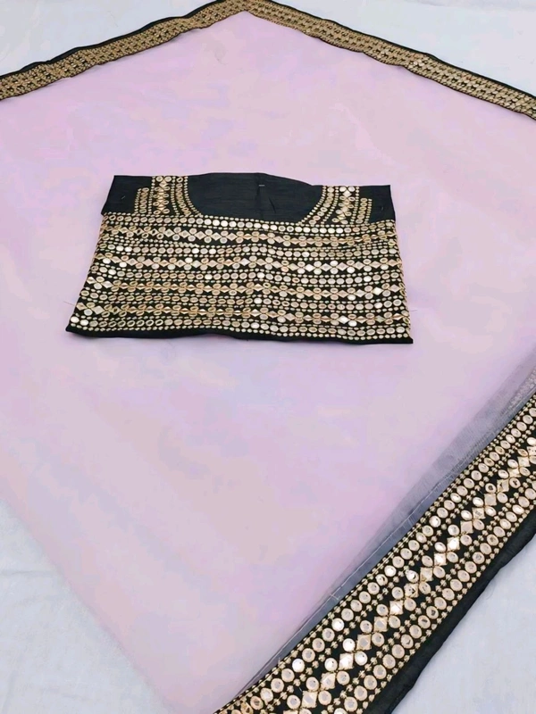 Net  Pink Lace border Saree With Blouse. Elevate your elegance with our exquisite Net Lace Saree, a perfect blend of sophistication and glamour. Crafted from high-quality net fabric, this saree features intricate lace detailing that exudes timeless charm. - Free Size