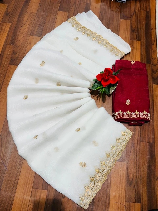 designer white saree with orange border  