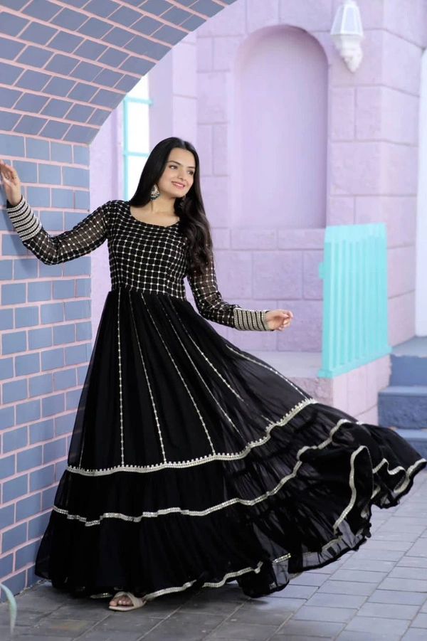 Faux Blooming gown with Sequins Multi Silver jari Embroidered Work  It looks graceful for women  it Designed to flatter all body types gowns for women combine the best parts of western and Indian wear into one stunning ensemble - wine